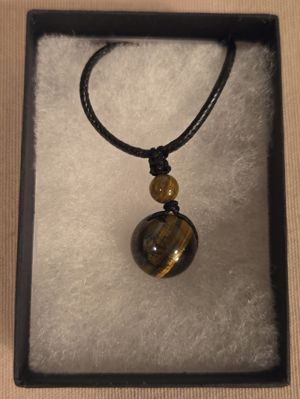 HANDCRAFTED TIGER'S EYE ON BLACK LEATHER CORD